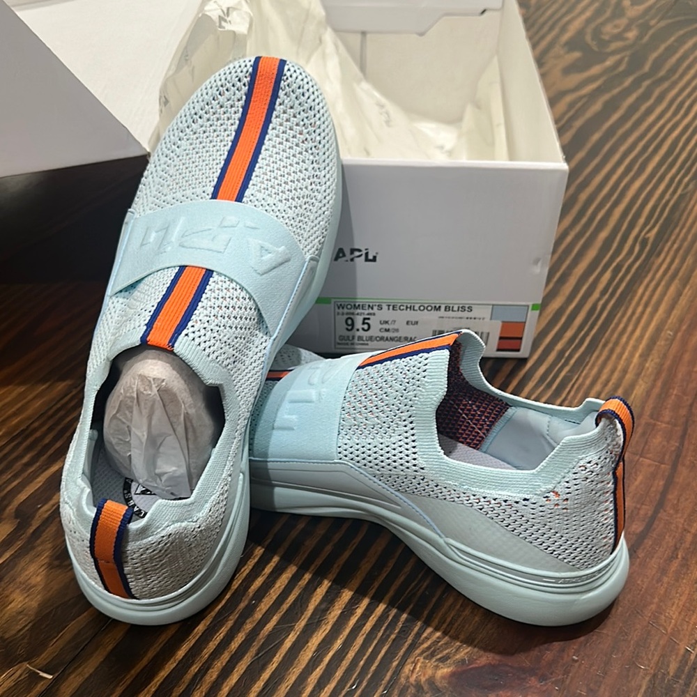 APL Techloom Bliss Light Blue Sneakers with Orange and Navy Stripes